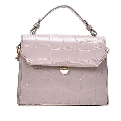 Stevvex pale pink crocodile-embossed PU leather crossbody bag with top handle on Tampa Home & Garden Store