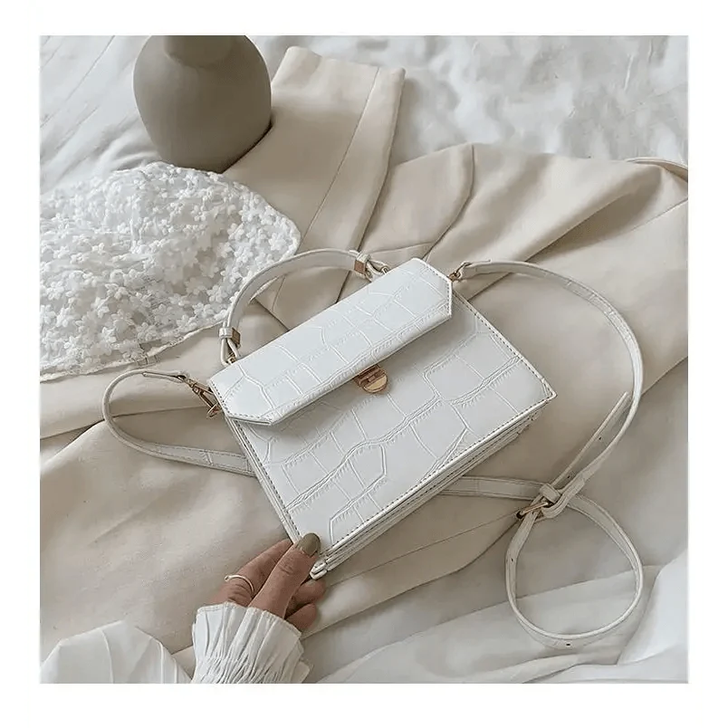 White croc-embossed crossbody bag by Stevvex with front flap; small PU leather evening handbag on Tampa Home & Garden Store