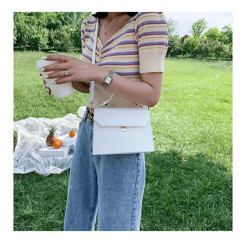 White PU leather crossbody bag with flap and gold hardware by Stevvex, small evening bag on Tampa Home & Garden Store