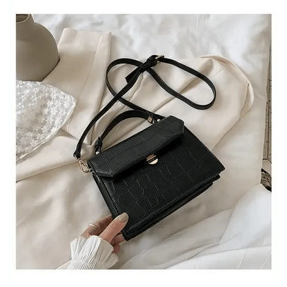 Crossbody bag Stevvex in black crocodile-embossed PU leather with gold clasp on Tampa Home & Garden Store