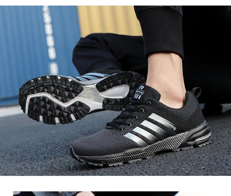 Stevvex men's running sneakers black mesh upper with white stripes and non-slip outsole on Tampa Home & Garden Store