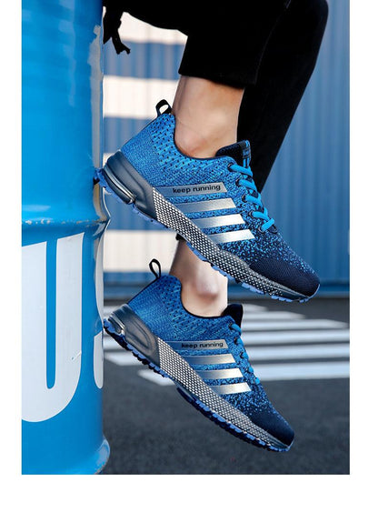 Stevvex Luxury Sport men's sneakers pair with blue mesh, silver stripes and non-slip outsole on Tampa Home & Garden Store