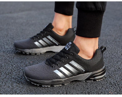 Stevvex black mesh men's sneakers with white stripes, breathable non-slip running shoes on Tampa Home & Garden Store