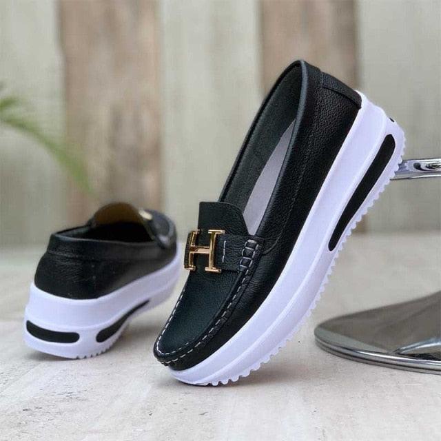 Stevvex black espadrille loafers with gold H-buckle and white sole on Tampa Home & Garden Store