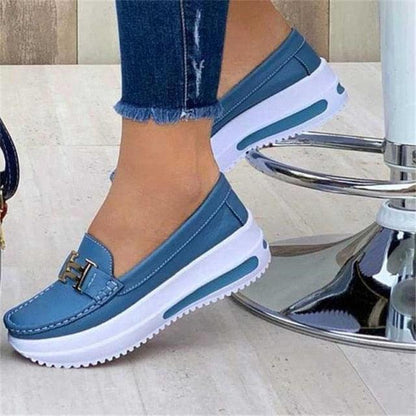 Stevvex blue slip-on espadrille sneakers with white sole and gold buckle detail on Tampa Home & Garden Store