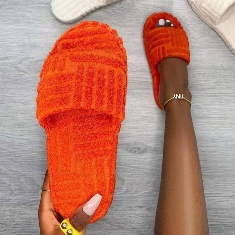Stevvex orange fuzzy slippers pair with memory foam sole for lounge wear on Tampa Home & Garden Store