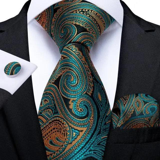 Stevvex silk necktie set with cufflinks and pocket square in teal paisley design on black suit on Tampa Home & Garden Store