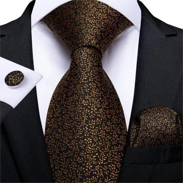 Stevvex silk necktie set in brown gold speckle with matching pocket square on black suit on Tampa Home & Garden Store