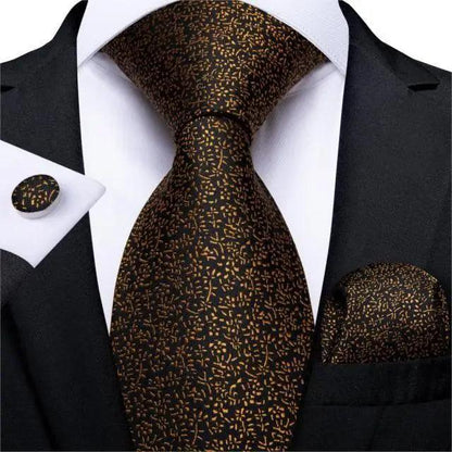 Stevvex silk necktie set in brown gold speckle with matching pocket square on black suit on Tampa Home & Garden Store