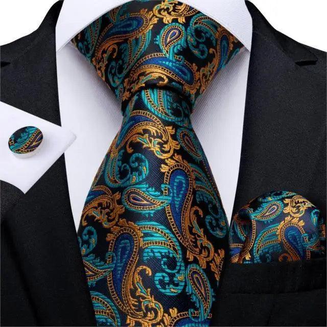 Stevvex paisley silk necktie set with matching teal and gold pocket square and cufflinks on Tampa Home & Garden Store