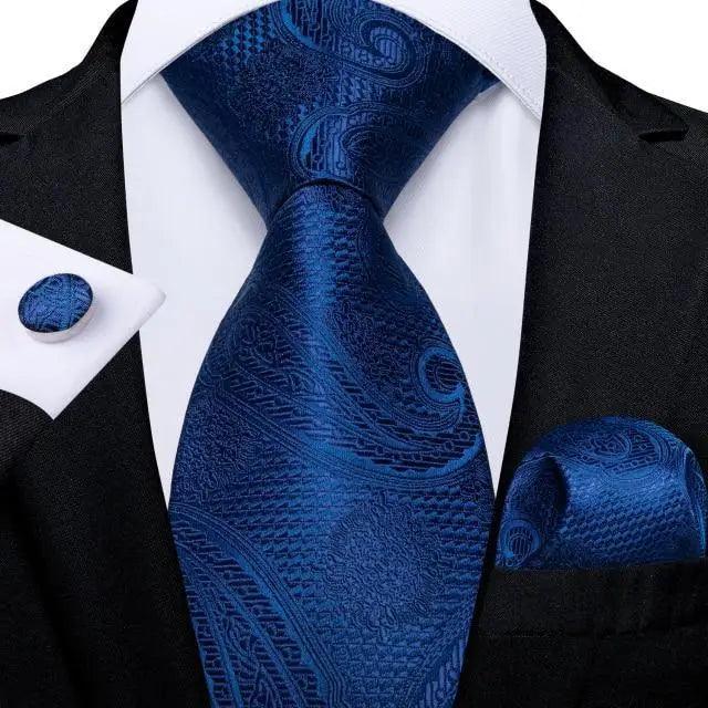 Blue silk necktie from Stevvex with floral paisley pattern, matching pocket square and cufflinks on Tampa Home & Garden Store