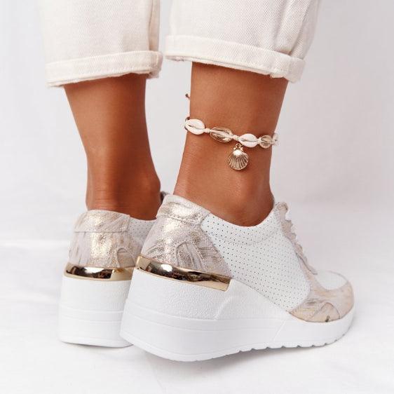 Stevvex white platform sneakers with gold metallic heel accents, perforated sides, pair on Tampa Home & Garden Store