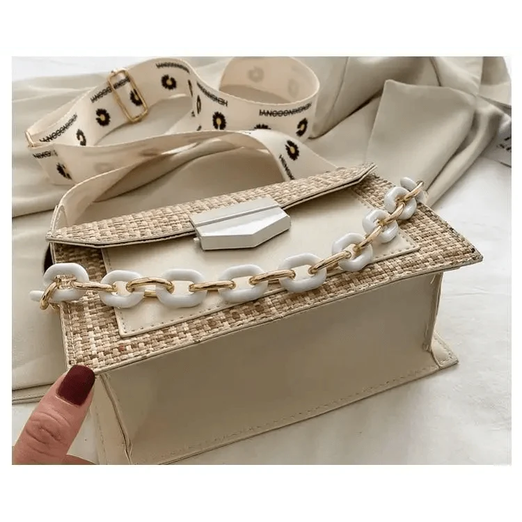 Stevvex luxury straw-woven shoulder bag with white chunky chain strap on Tampa Home & Garden Store