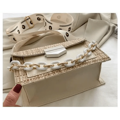 Stevvex luxury straw-woven shoulder bag with white chunky chain strap on Tampa Home & Garden Store