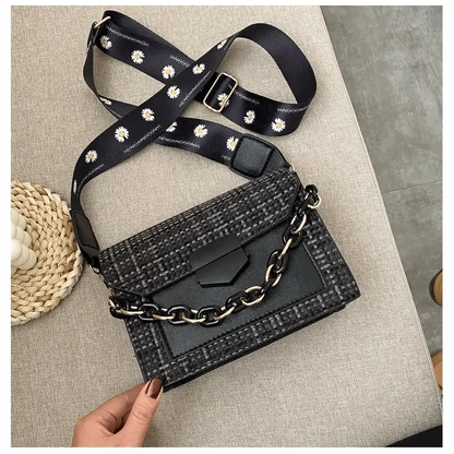 Shoulder bag by Stevvex in black tweed with chain strap and a wide daisy strap on Tampa Home & Garden Store