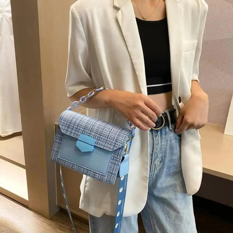 Stevvex luxury shoulder bag in light blue tweed with front flap and chain strap on Tampa Home & Garden Store