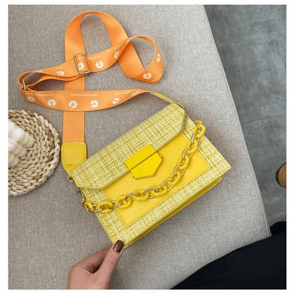 Stevvex yellow woven shoulder bag with hexagon clasp and chunky chain strap orange strap on Tampa Home & Garden Store