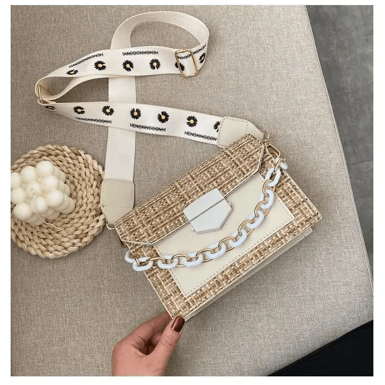 Stevvex luxury shoulder bag in beige straw with white leather trim and chunky chain on Tampa Home & Garden Store