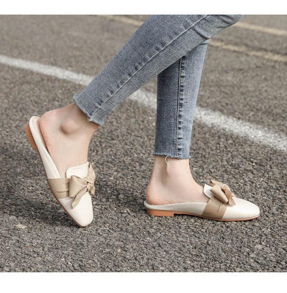Stevvex women's beige bow-front mule sandals pair with flat heel on Tampa Home & Garden Store
