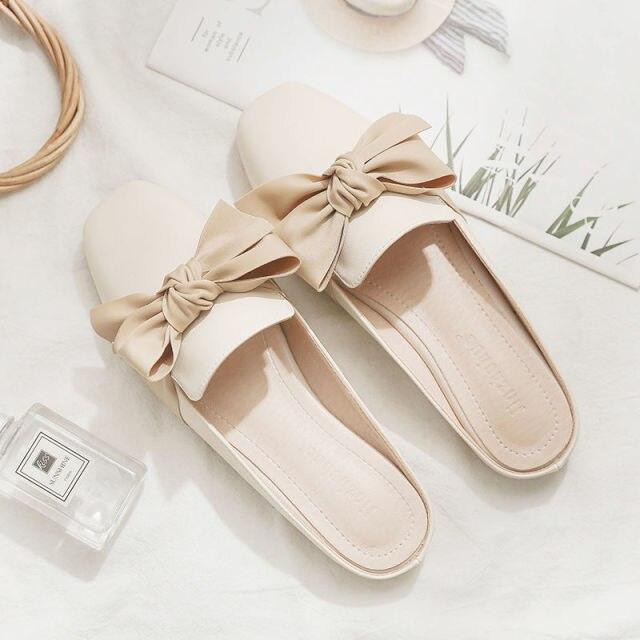 Beige close-toe bow slide sandals with a large knot, flat-heel women's summer flats on Tampa Home & Garden Store