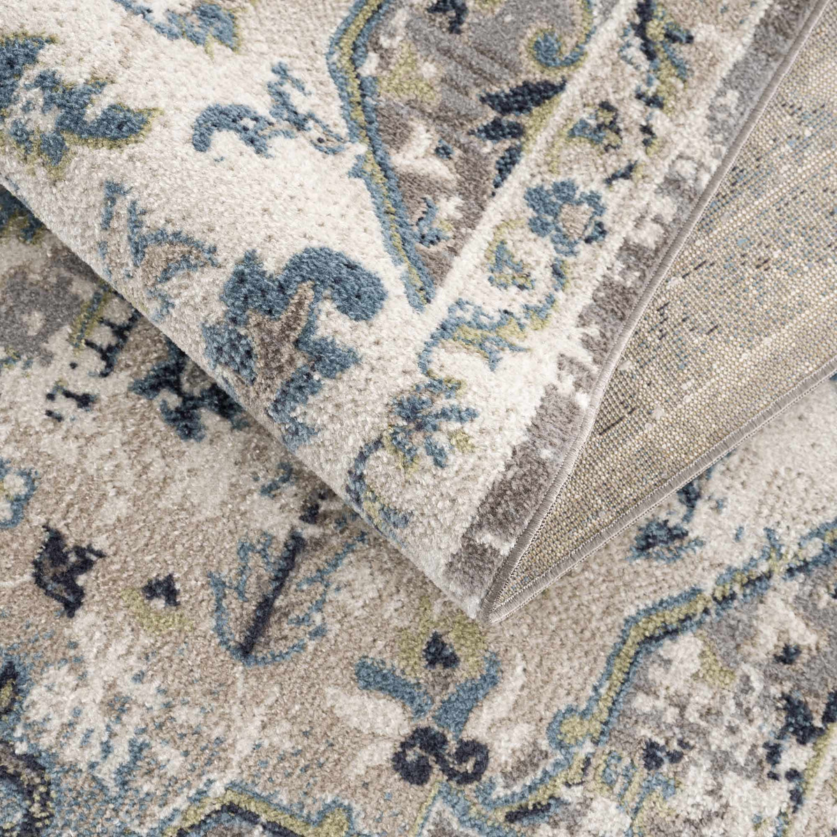 Area rug Cabacungan gray & blue with blue floral motifs on beige field by Boutique Rugs on Tampa Home & Garden Store
