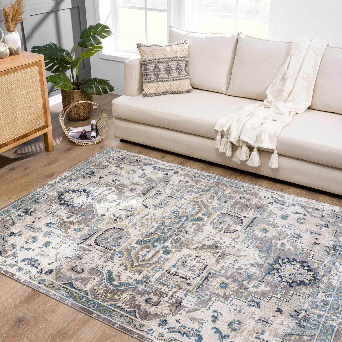 Cabacungan Gray & Blue Washable Area Rug with gray-blue tones in living room on Tampa Home & Garden Store