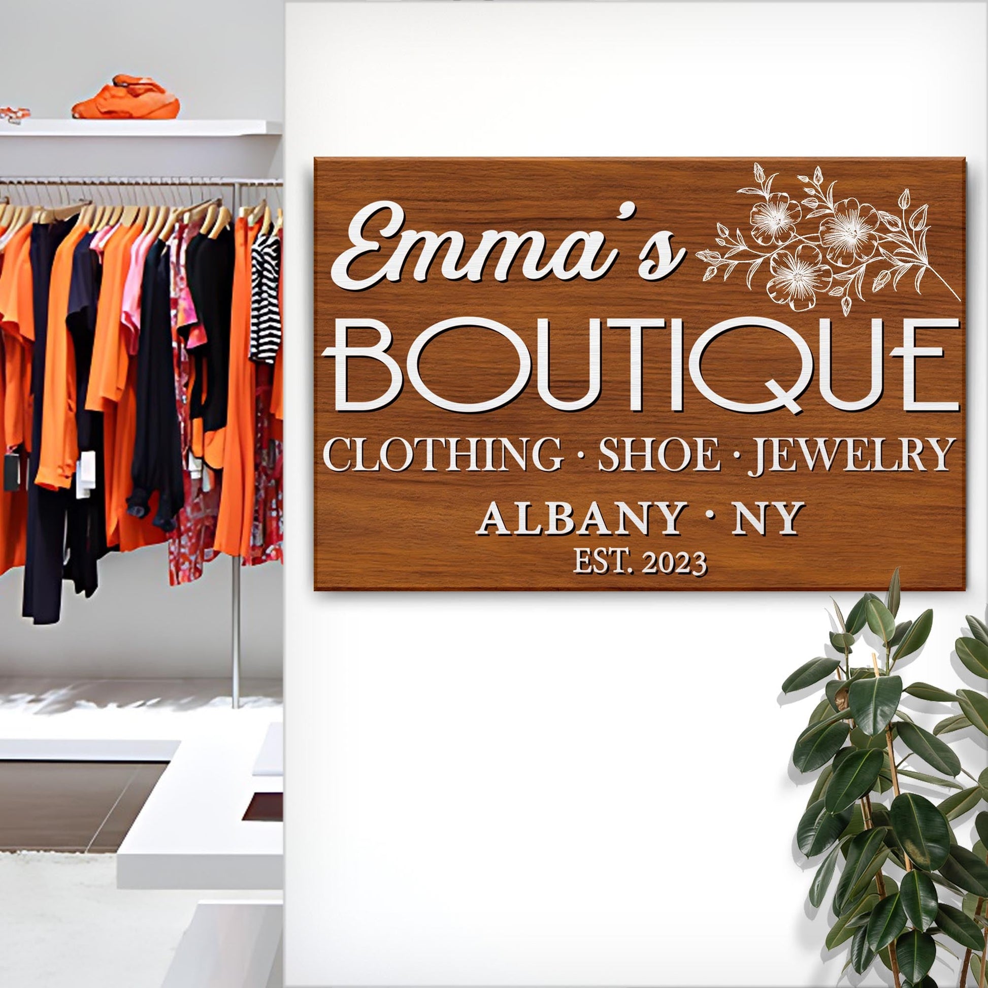 Boutique Sign V canvas by Tailored Canvases on wood-grain panel with white floral motif on Tampa Home & Garden Store