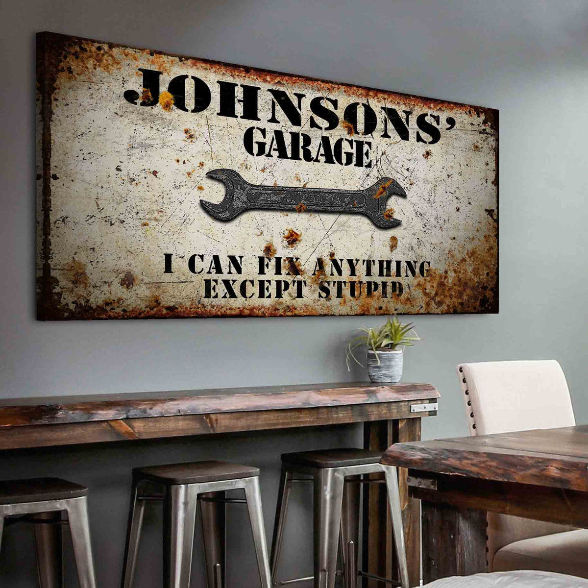 Garage Sign canvas with I CAN FIX ANYTHING EXCEPT STUPID and a wrench on rusted background on Tampa Home & Garden Store