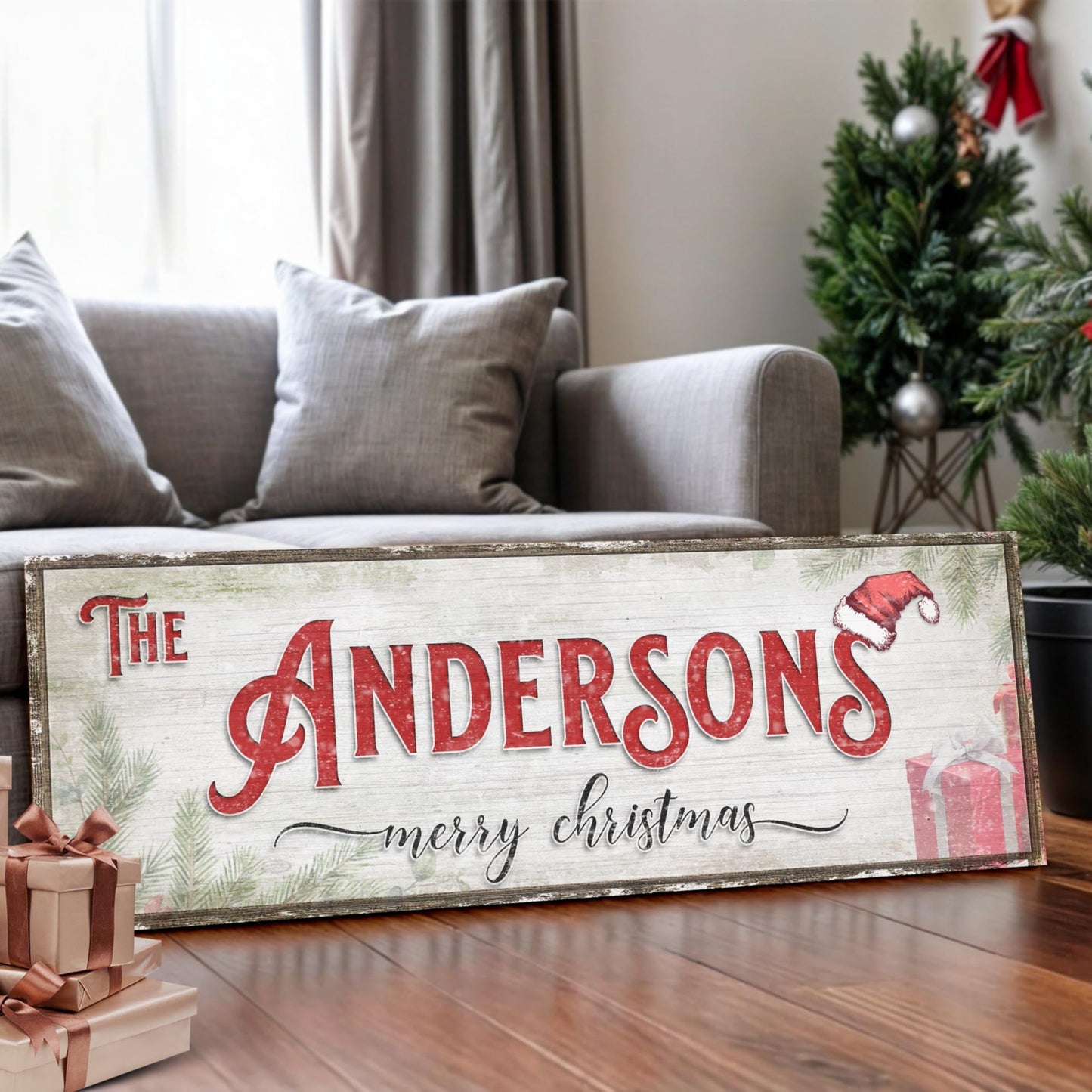 Canvas Christmas Family Name Sign V with red Andersons script beside a Christmas tree on Tampa Home & Garden Store