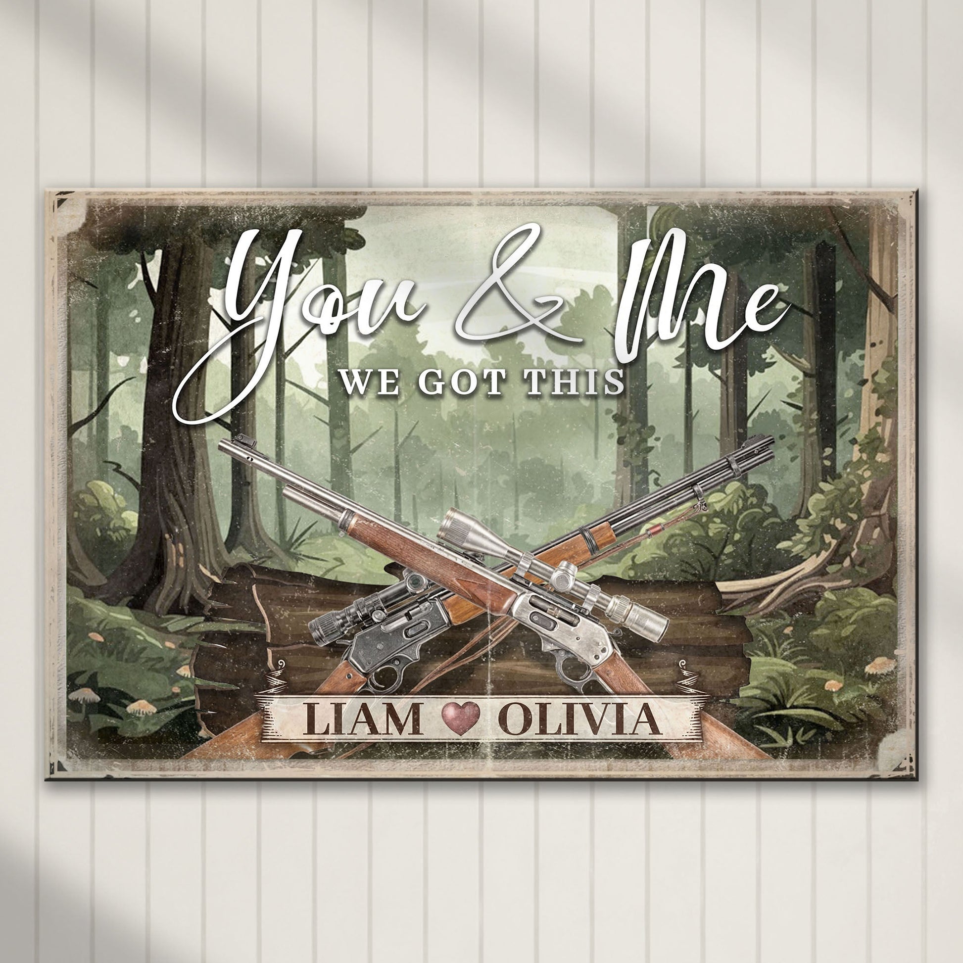 Gun themed We Got This couple sign canvas with woods backdrop and crossed rifles LIAM OLIVIA on Tampa Home & Garden Store
