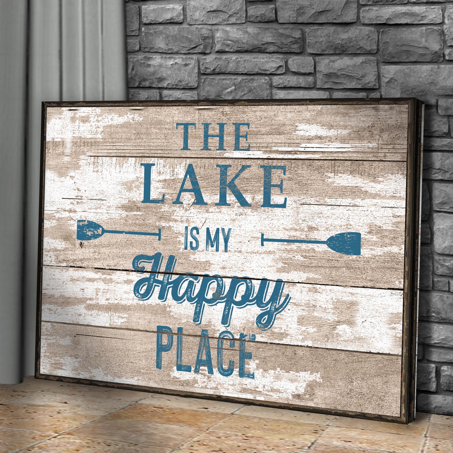 Canvas sign The Lake Is My Happy Place III with beige wood and blue lettering on a dark frame on Tampa Home & Garden Store