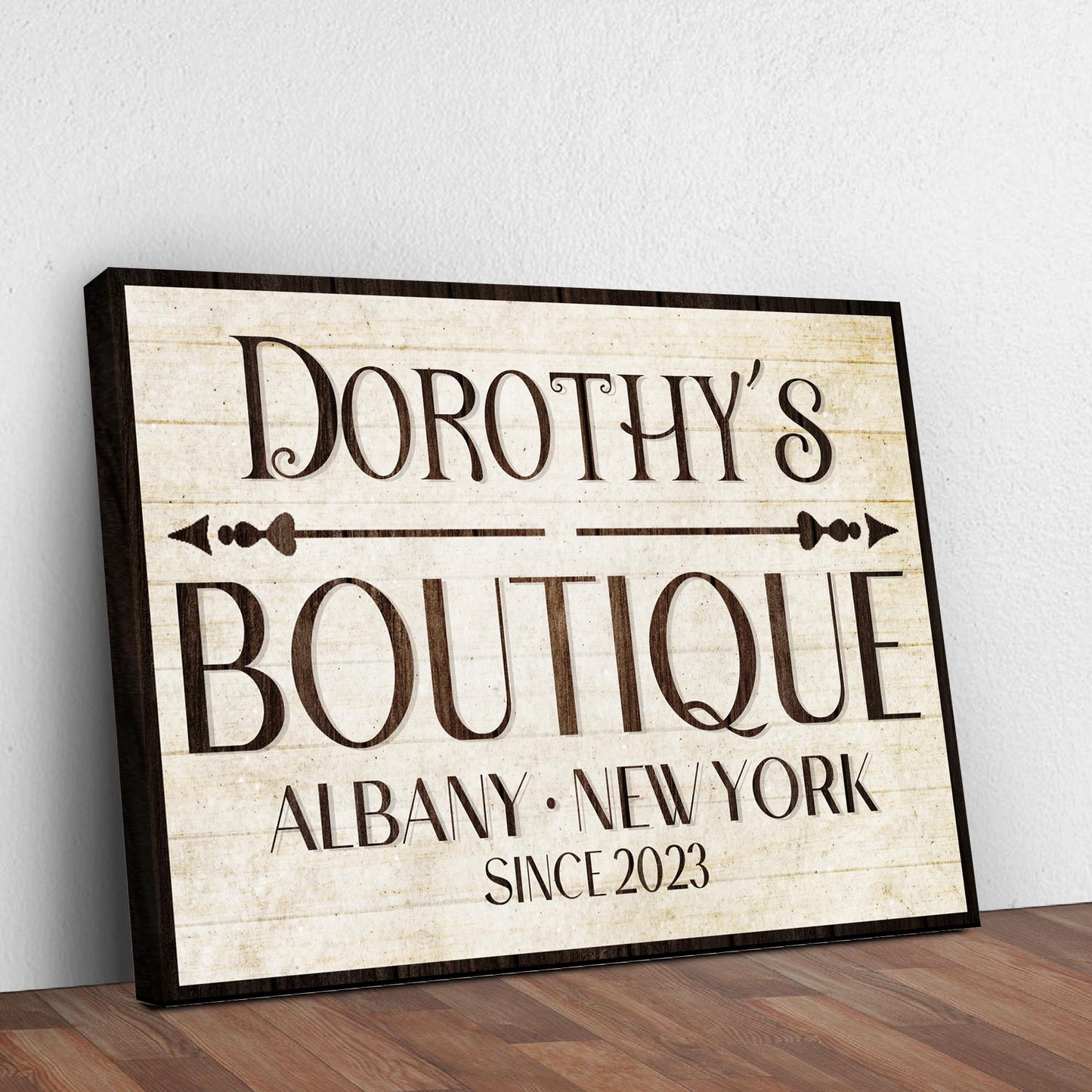 Boutique Sign IV canvas with vintage beige aged-paper look and dark wood frame, bold serif lettering on Tampa Home & Garden Store