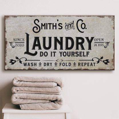 Laundry Room Sign ll canvas with distressed beige backdrop and bold black typography on Tampa Home & Garden Store