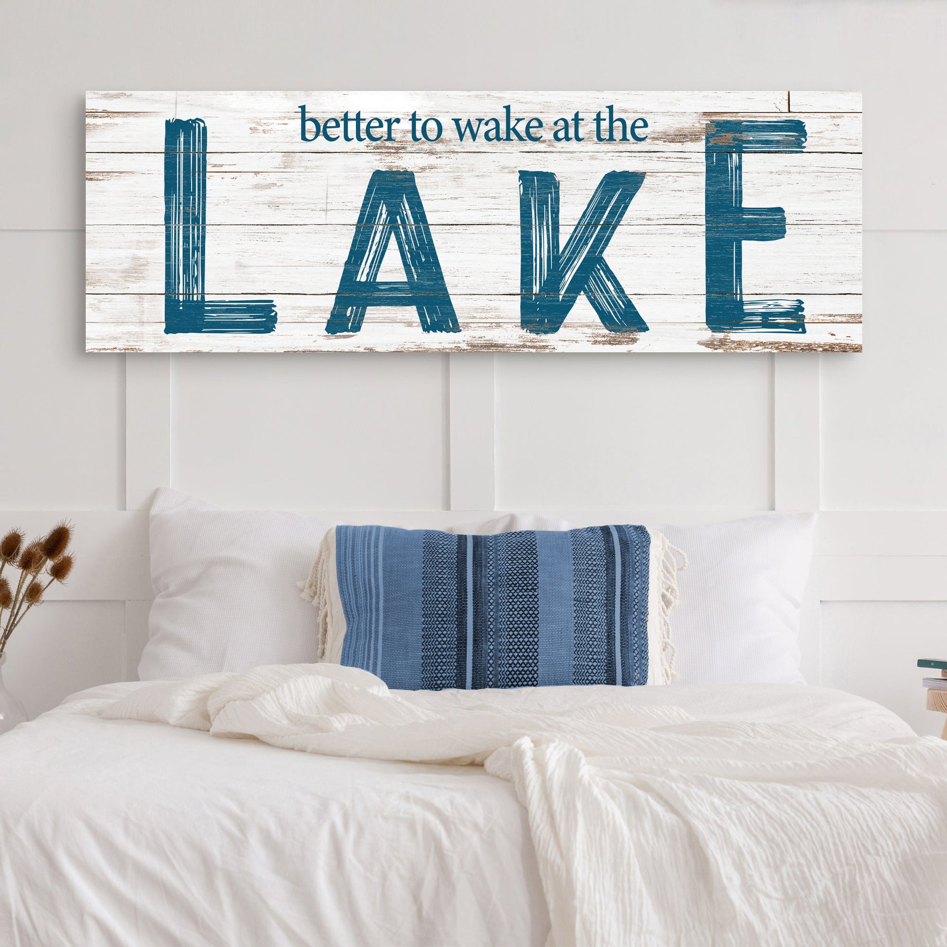 Better To Wake At The Lake Sign II canvas with distressed white wood background and blue LAKE letters on Tampa Home & Garden Store
