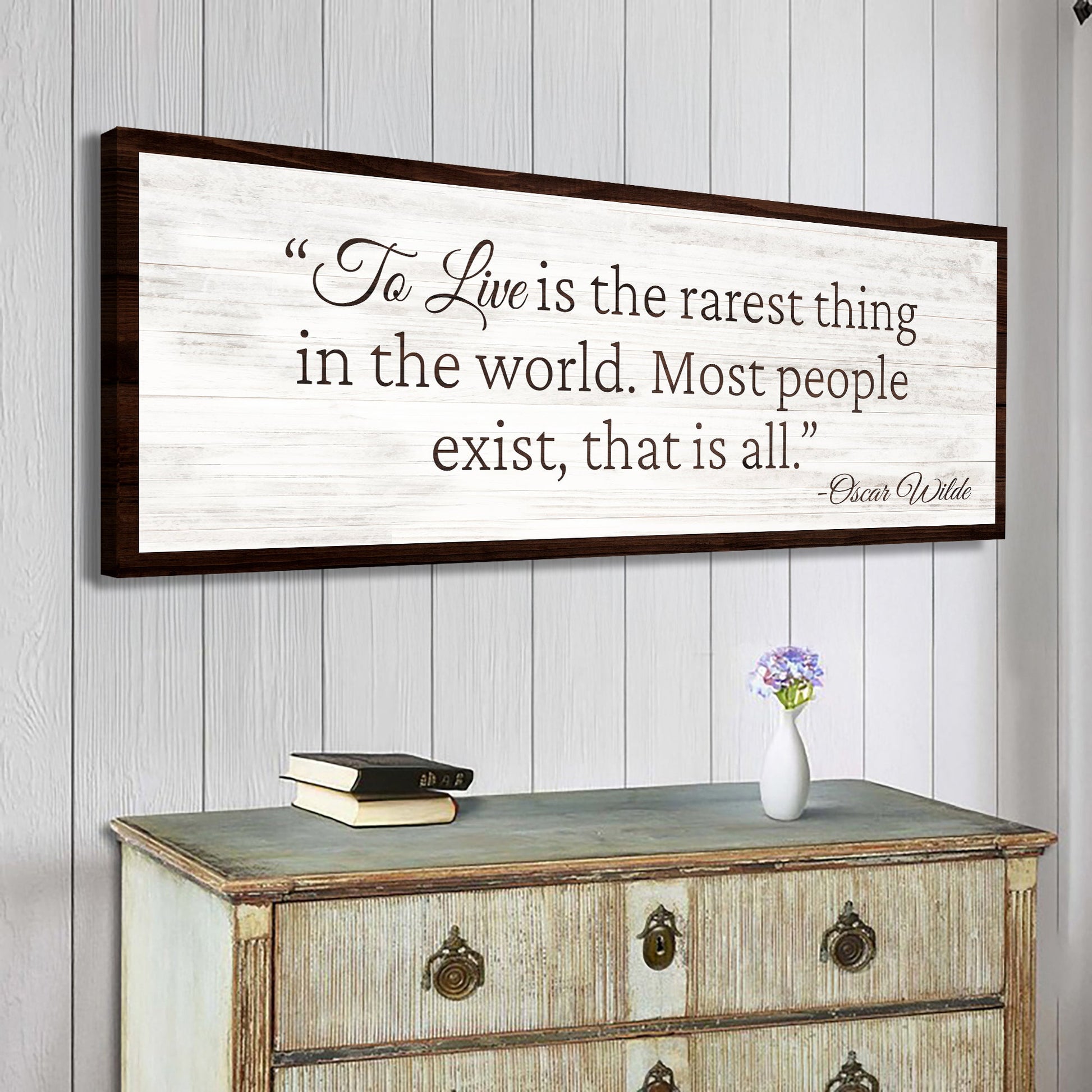 To Live Is The Rarest Thing Farmhouse Sign II canvas with distressed white backdrop and dark frame Tailored Canvases on Tampa Home & Garden Store