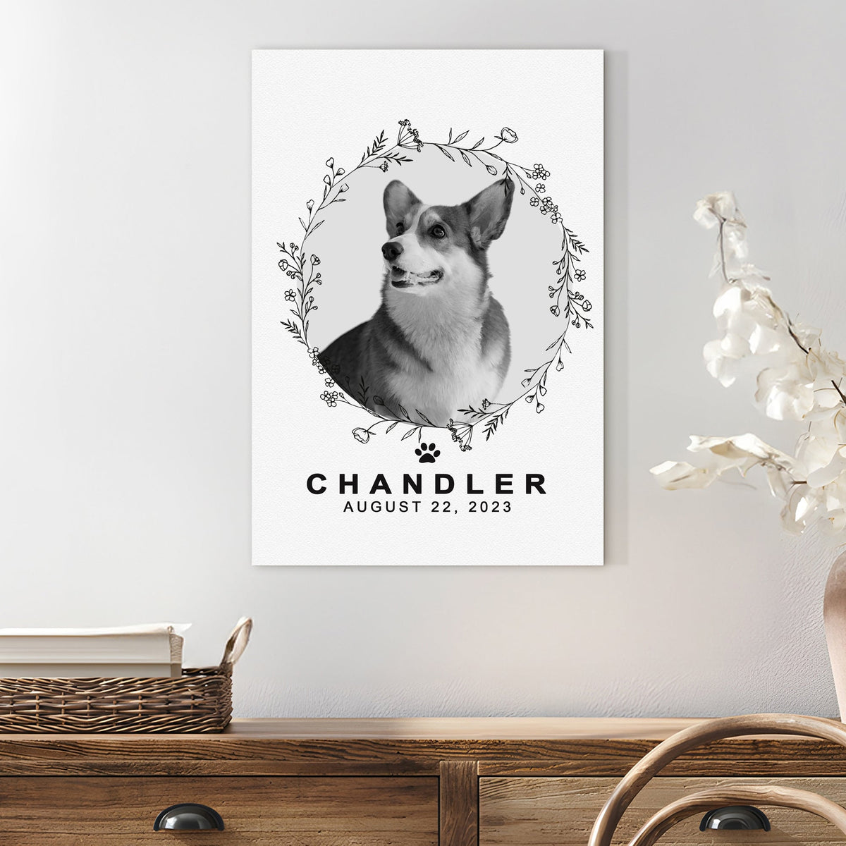 Pet memorial portrait canvas in monochrome with a circular floral wreath around Chandler on Tampa Home & Garden Store