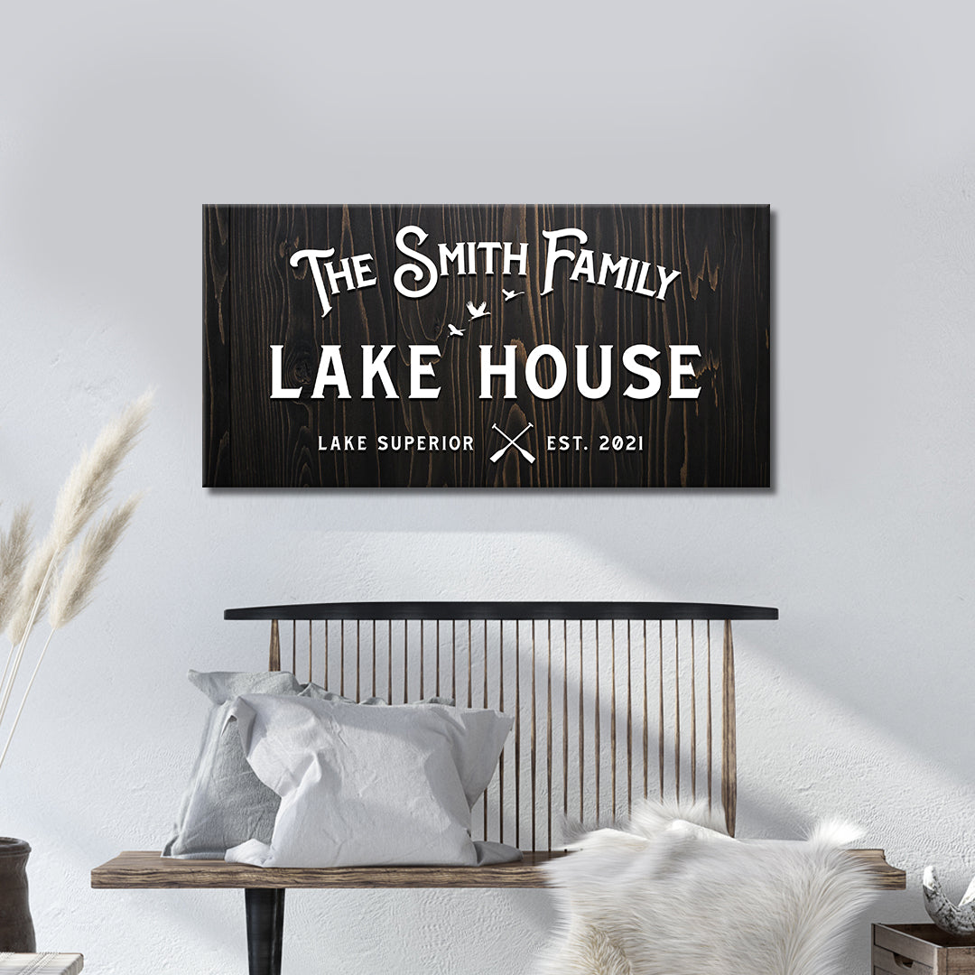 Rustic Family Lake House Sign canvas with dark wood background and white lettering on Tampa Home & Garden Store