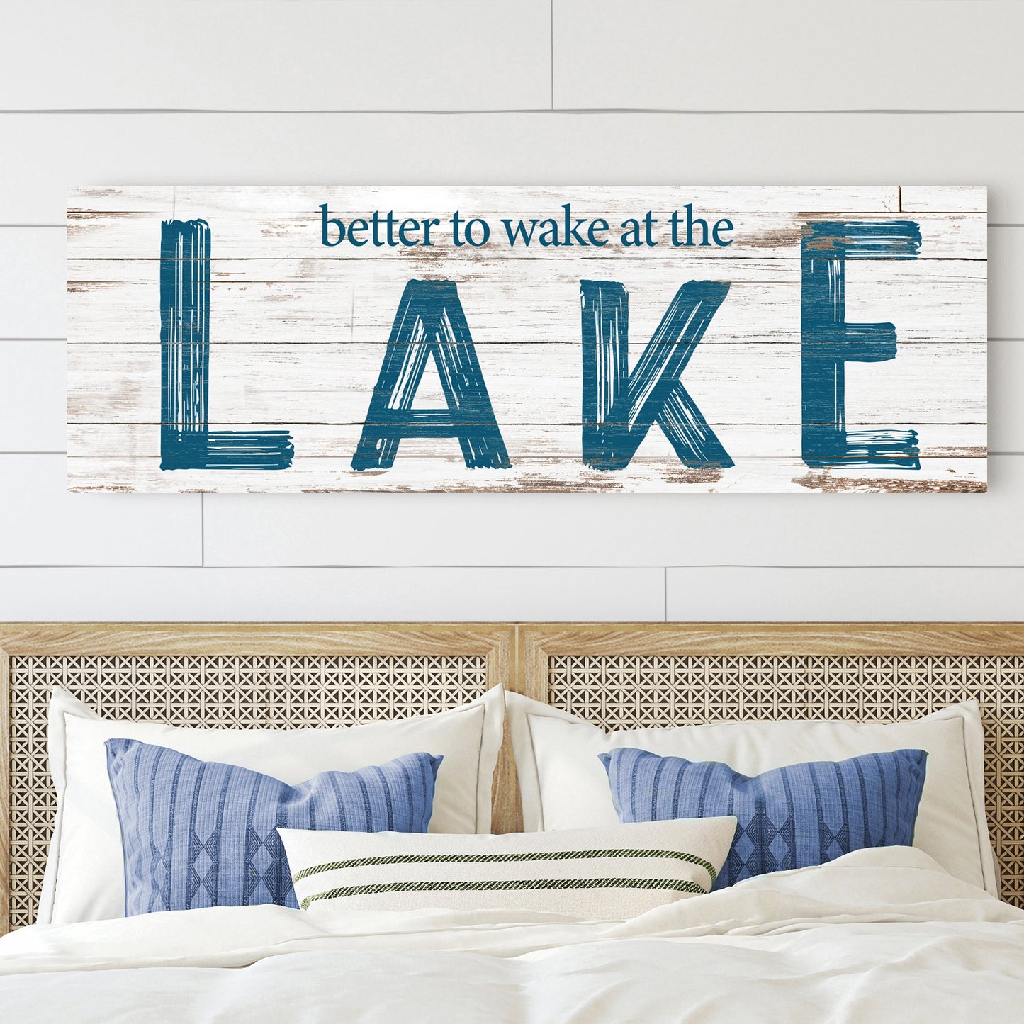 Better To Wake At The Lake Sign II canvas with distressed white wood background and bold blue LAKE lettering on Tampa Home & Garden Store