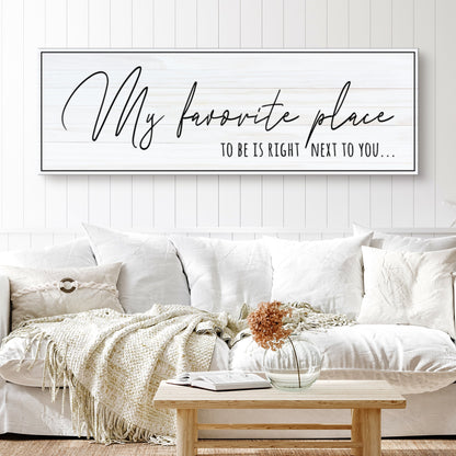 Canvas sign My Favorite Place To Be Is Right Next To You, whitewashed wood backdrop, black frame on Tampa Home & Garden Store