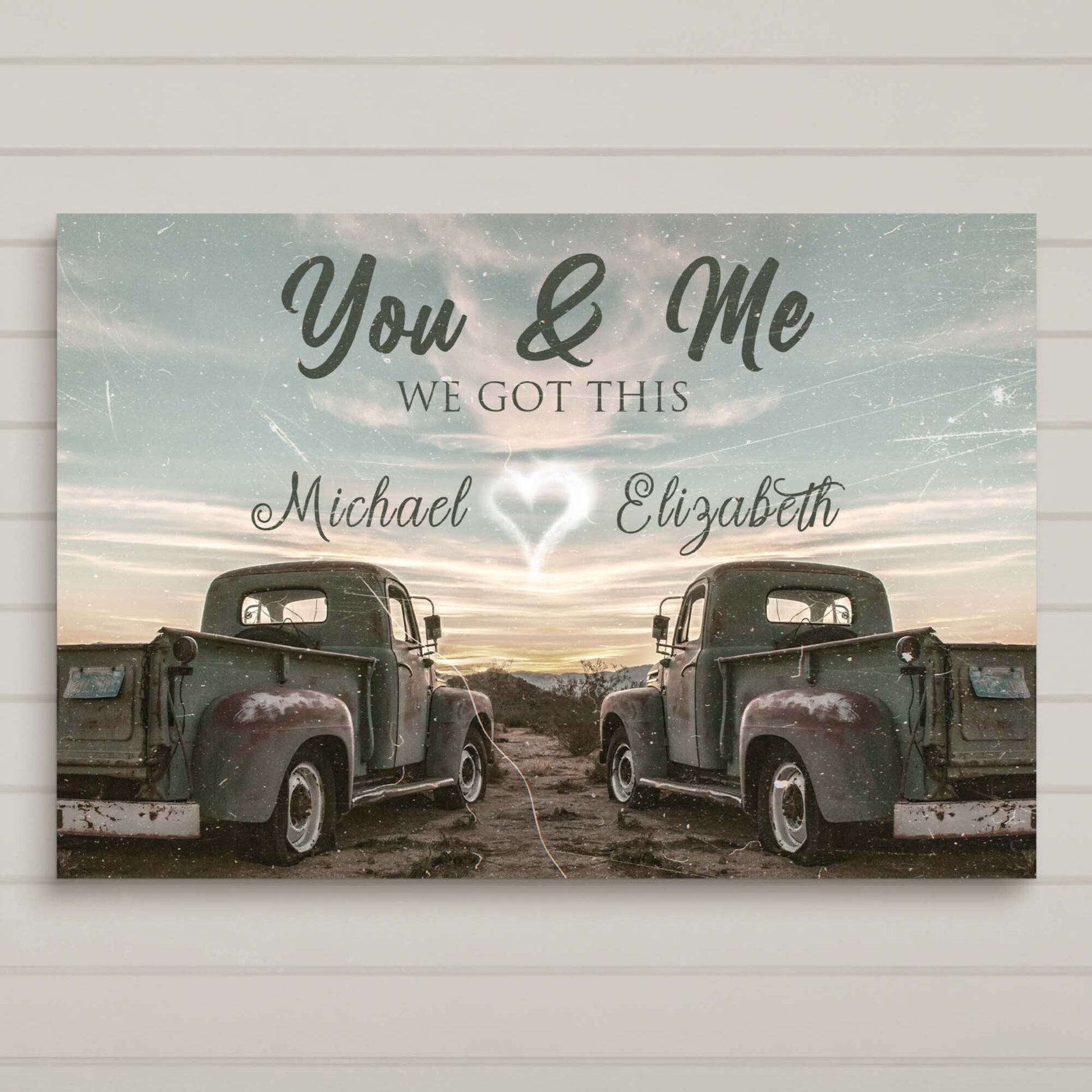 Canvas sign with vintage truck design featuring two trucks, You & Me and We Got This text on Tampa Home & Garden Store
