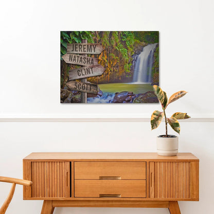 Waterfall Family Names Sign canvas print with rustic signposts beside a lush waterfall on Tampa Home & Garden Store