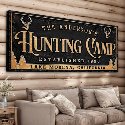 Personalized Family Hunting Camp Sign canvas with gold lettering on black and deer antler accents on rustic backdrop on Tampa Home & Garden Store
