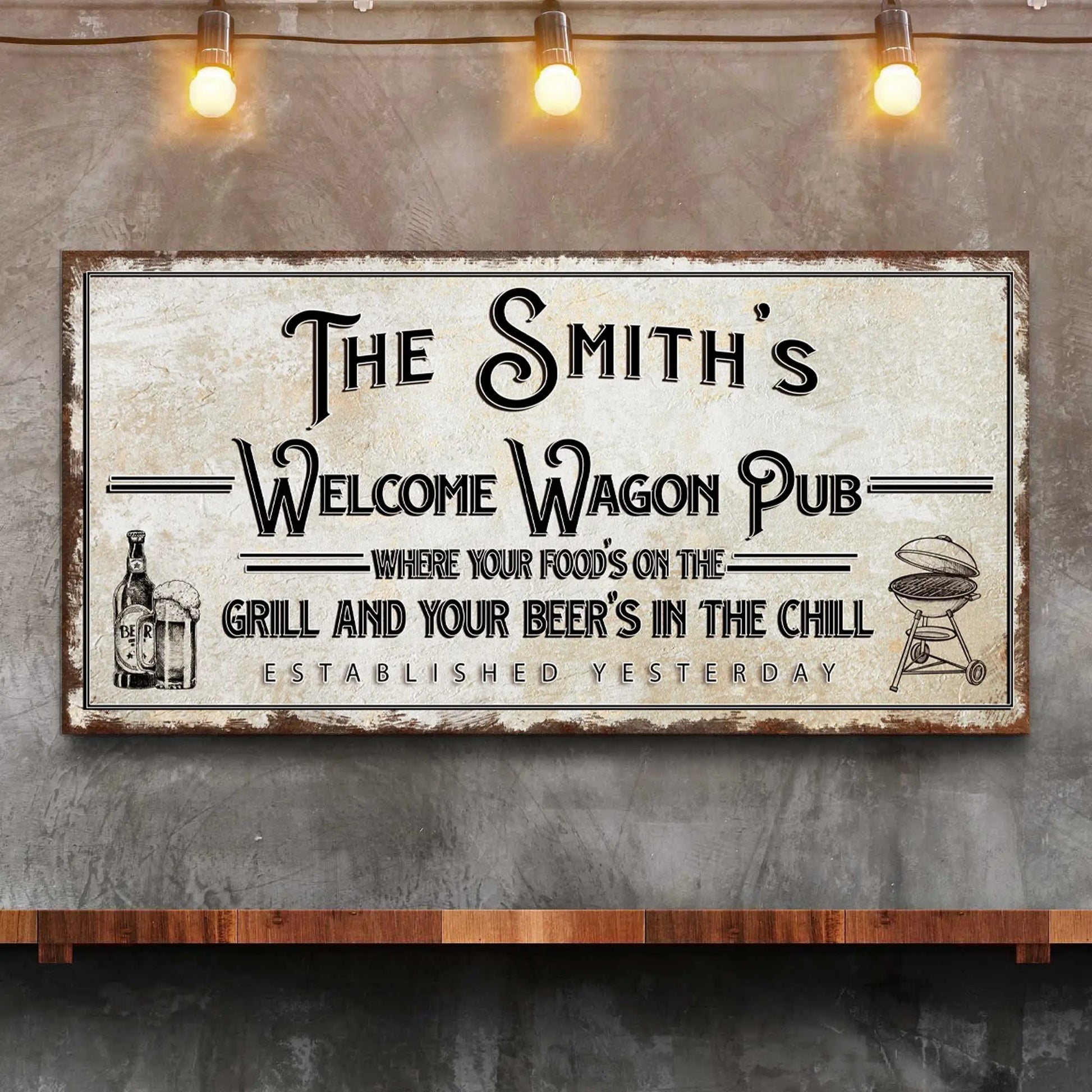 Canvas sign The Smith's Welcome Wagon Pub with distressed frame and warm string lights on Tampa Home & Garden Store