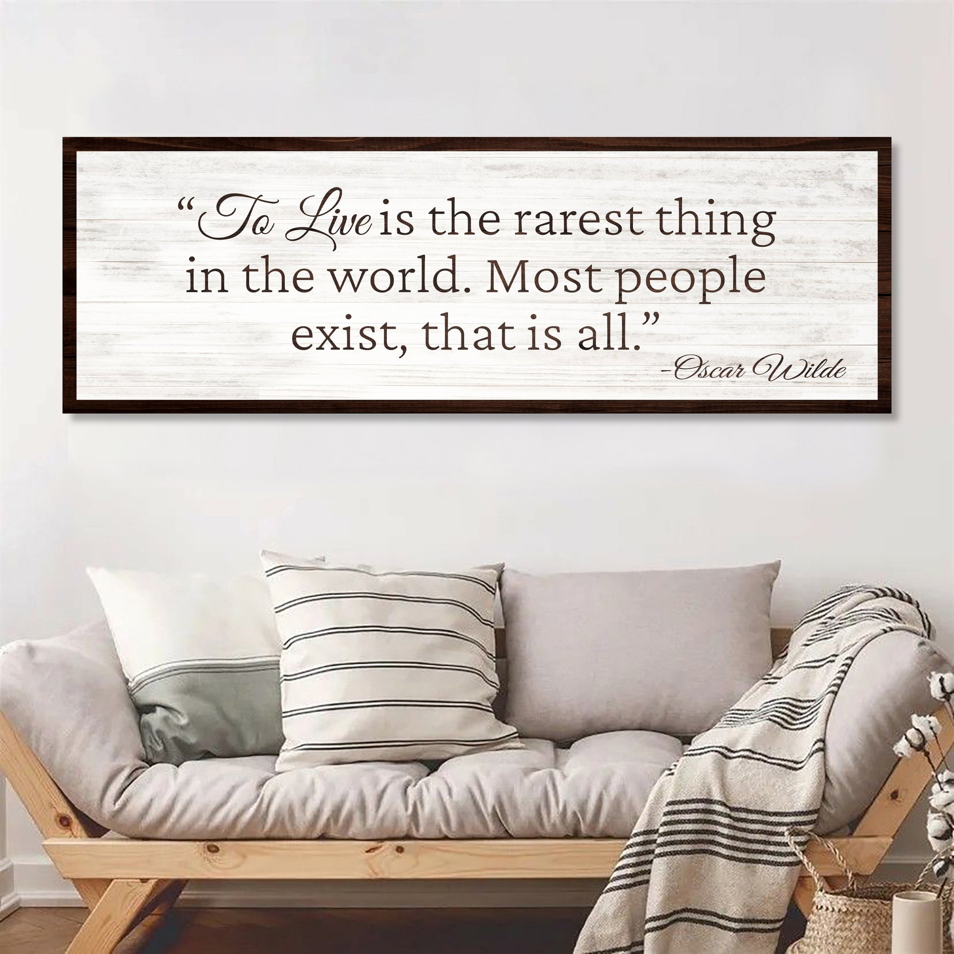 To Live Is The Rarest Thing Farmhouse Sign II canvas with whitewashed plank background and dark brown frame on Tampa Home & Garden Store