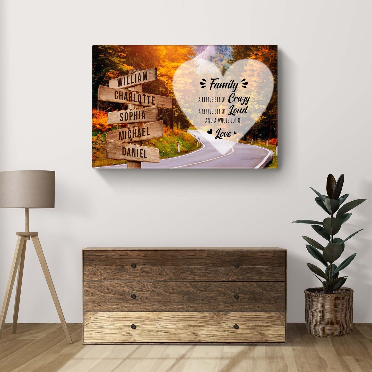 Canvas art A Lot of Love Family Names Sign II by Tailored Canvases, autumn road with wooden name signs and heart overlay on Tampa Home & Garden Store