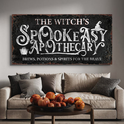 Canvas sign The Witch's Spookeasy Apothecary with white chalk lettering witch hat cauldron on Tampa Home & Garden Store