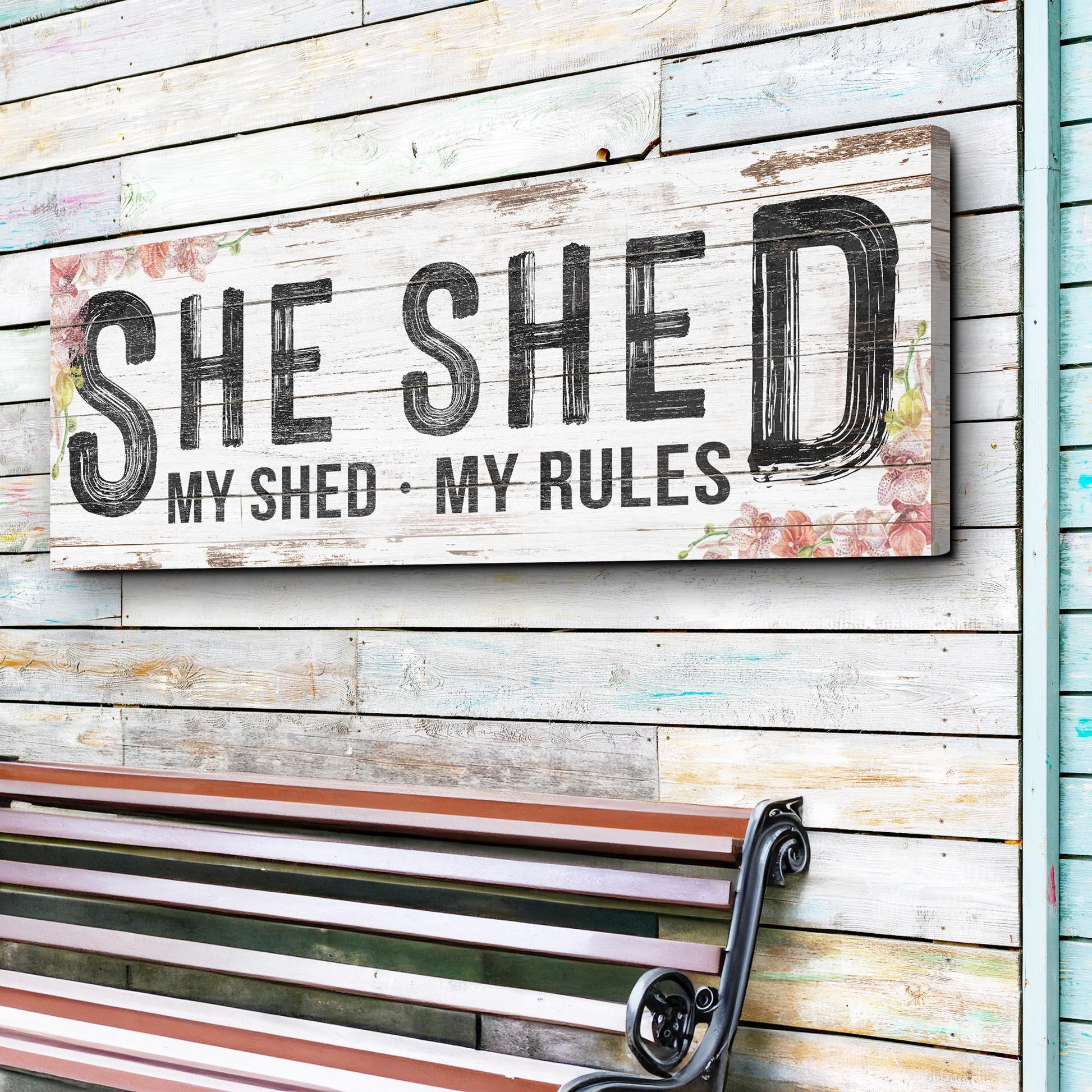 Personalized She Shed Sign XIV canvas with rustic whitewashed wood background and floral accents on Tampa Home & Garden Store