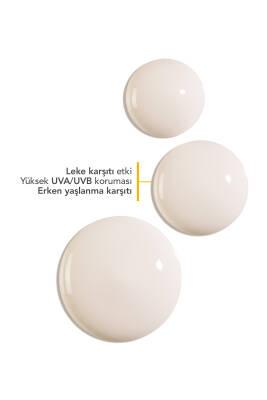 Bioderma Photoderm Spot Sunscreen SPF 50+ three beige lotion droplets on white background on Tampa Home & Garden Store