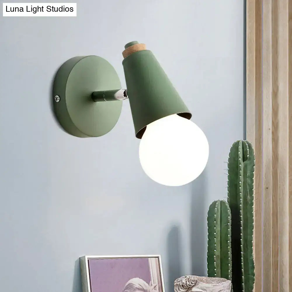 Decorbites green cone wall sconce with round backplate and white globe bulb on Tampa Home & Garden Store