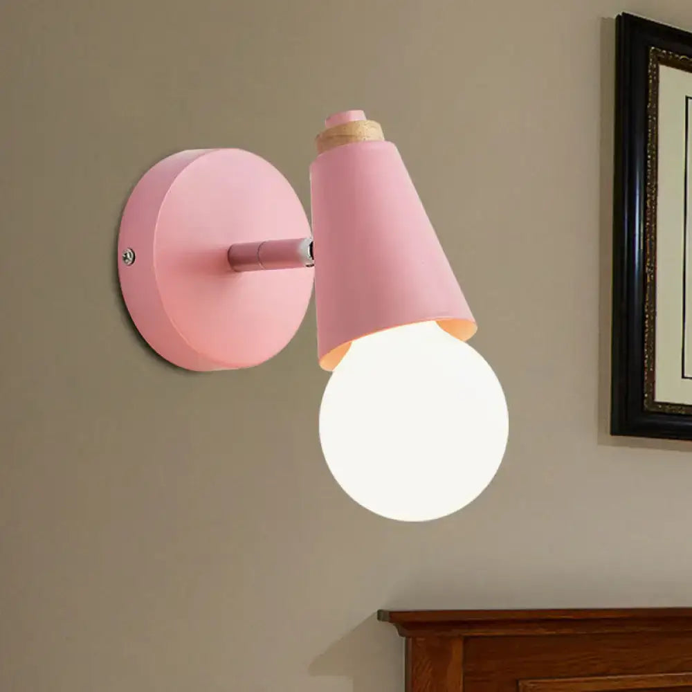 Pink cone wall sconce by Decorbites with white globe bulb on Tampa Home & Garden Store